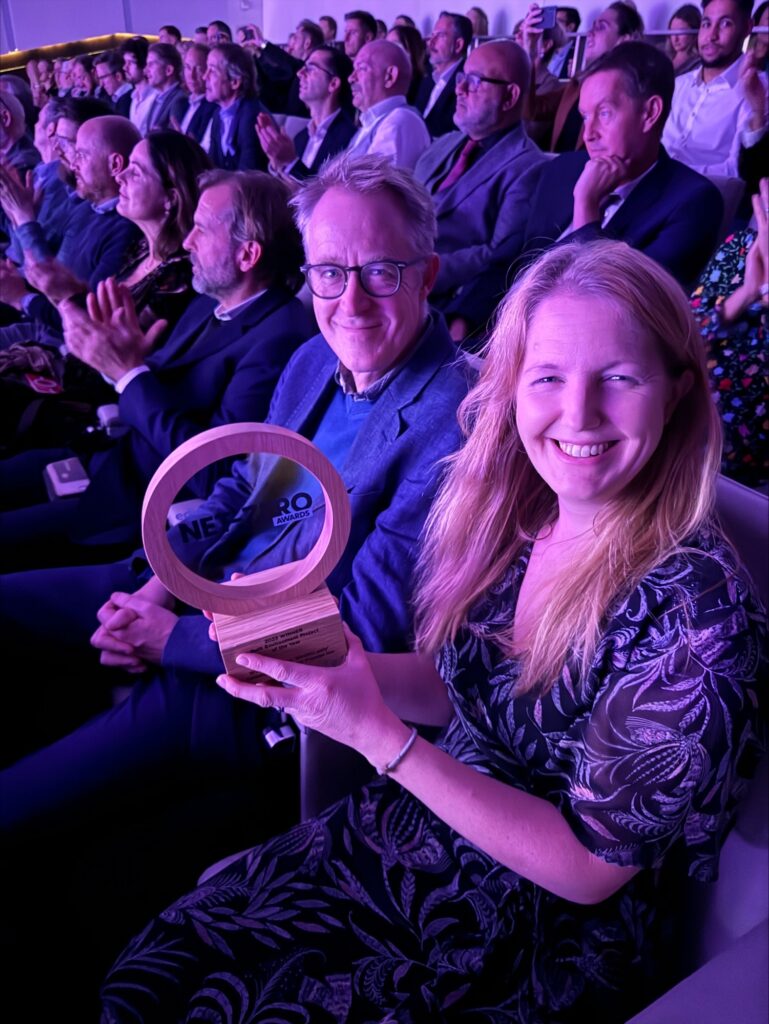 Sarah Ivory Holding The Edie Built Environment Project Of The Year Award